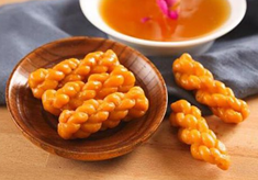 黃精茶攜手眾望小麻花，咸寧兩產(chǎn)品啟用“荊楚放心禮”標(biāo)識(shí)，助力地方品牌升級(jí)